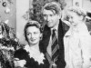 George Bailey (James Stewart), Mary Bailey (Donna Reed), and their youngest daughter Zuzu (Karolyn Grimes) in It’s a Wonderful Life. George Bailey (James Stewart), Mary Bailey (Donna Reed), and their youngest daughter Zuzu (Karolyn Grimes) in It’s a Wonderful Life.